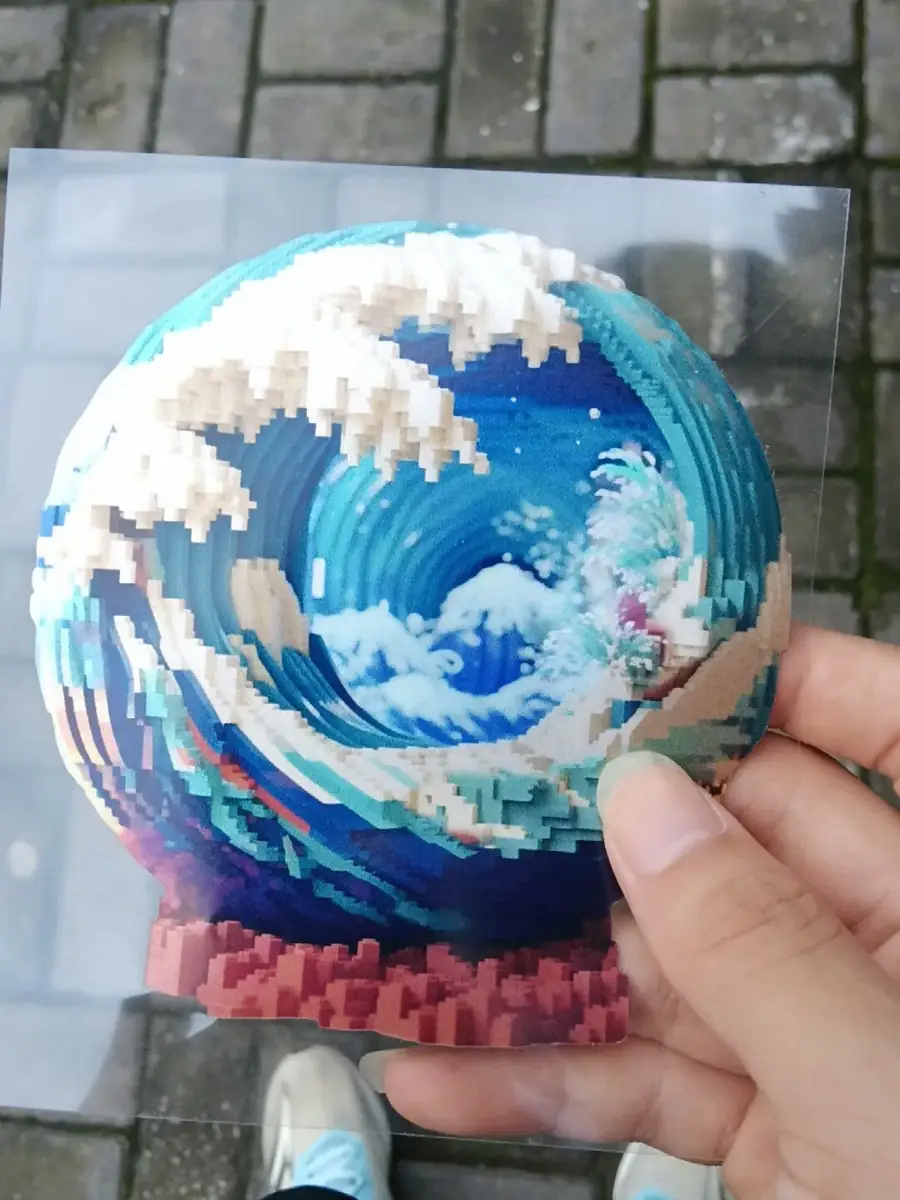 Layered blue wave artwork printed as a transparent custom sticker